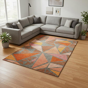 HomeRoots 9' x 12' Geometric Rust Orange and Salmon Area Rug - Washable, UV-Protected, Family-Friendly Design! 681544