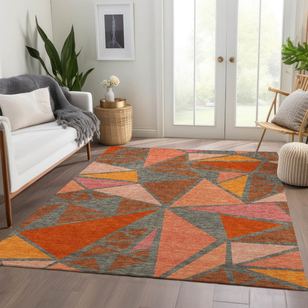 HomeRoots 10' X 14' Stylish Rust Orange & Salmon Geometric Area Rug - Washable, UV Protected, Durable Design 681545