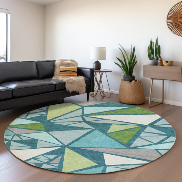 HomeRoots 8' Teal Green and Ivory Geometric Round Rug - Washable, UV-Protected, Soft & Stylish for Any Space 681548