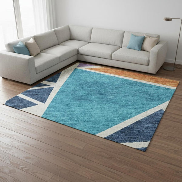 HomeRoots 8' X 10' Bold Washable Area Rug in Teal, Pink & Orange - UV Protected, Stain Resistant, Durable Design 681561