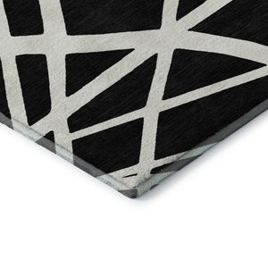 HomeRoots 5' X 8' Black And Ivory Geometric Area Rug - Stylish, Washable, UV-Protected for High-Traffic Spaces 681571