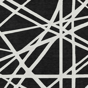 HomeRoots 5' X 8' Black And Ivory Geometric Area Rug - Stylish, Washable, UV-Protected for High-Traffic Spaces 681571