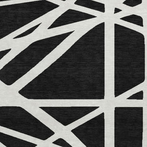 HomeRoots 8' Black & Ivory Geometric Washable Round Rug - Durable, UV-Protected, Ideal for Homes with Kids & Pets 681572