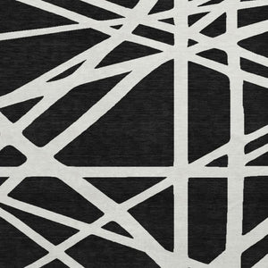 HomeRoots 8' Black & Ivory Geometric Washable Round Rug - Durable, UV-Protected, Ideal for Homes with Kids & Pets 681572
