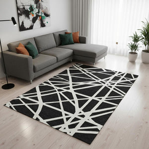 HomeRoots 8' X 10' Stylish Black and Ivory Geometric Area Rug – Washable, UV Protected, Perfect for Any Room! 681573