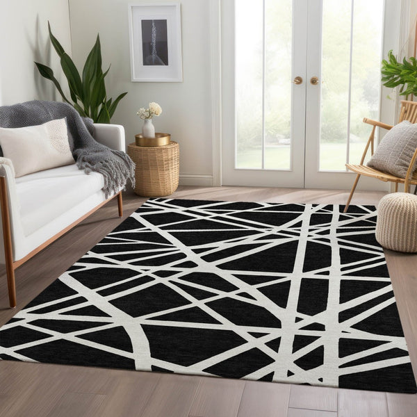 HomeRoots 10' X 14' Black And Ivory Geometric Area Rug - Washable, UV Protected, Durable & Stylish Design 681575