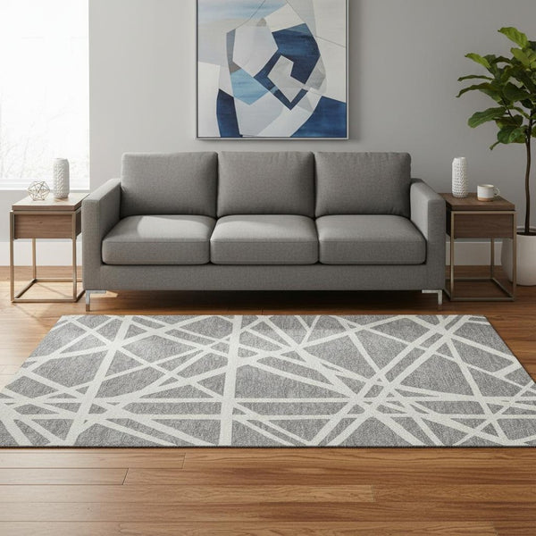 HomeRoots 5' X 8' Gray and Ivory Geometric Washable Area Rug with UV Protection for Stylish, Easy Care Living 681607