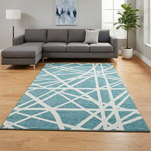 HomeRoots 8' X 10' Stylish Teal and Ivory Geometric Washable Area Rug with UV Protection for High-Traffic Areas 681645