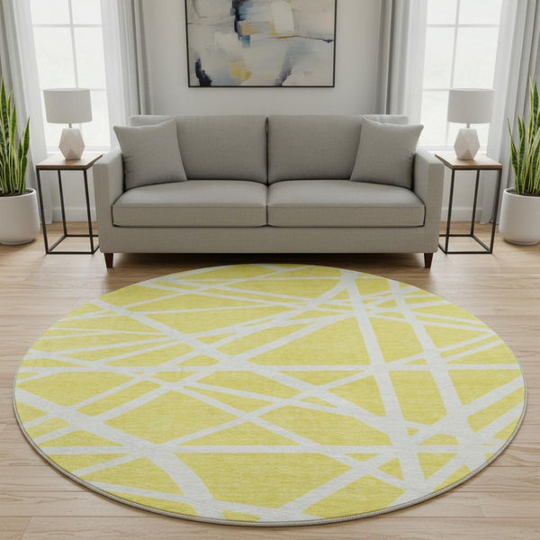 HomeRoots 8' Yellow and Ivory Geometric Round Rug - Washable, UV-Protected, Stylish & Durable for Any Space! 681650
