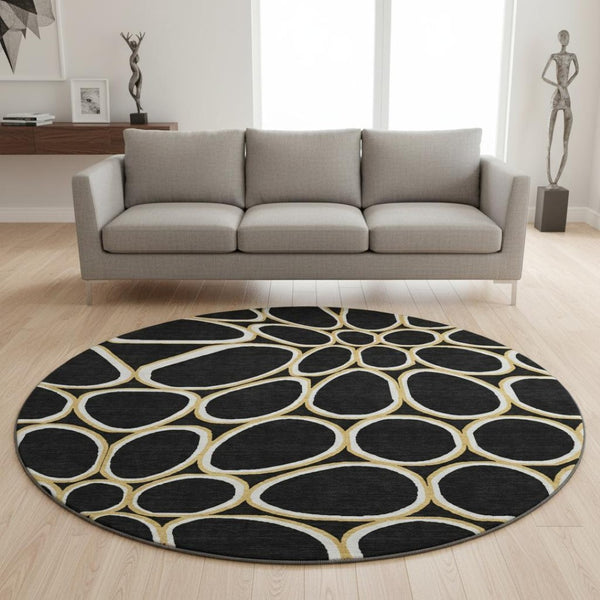 HomeRoots 8' Modern Black, Ivory & Gold Geometric Washable Round Rug with UV Protection & Non-Slip Backing 681668