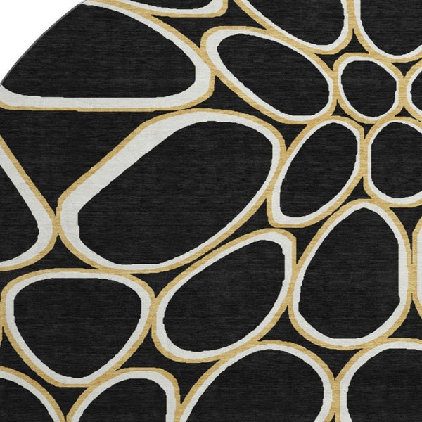 HomeRoots 8' Modern Black, Ivory & Gold Geometric Washable Round Rug with UV Protection & Non-Slip Backing 681668