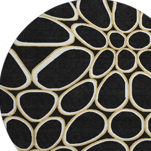 HomeRoots 8' Modern Black, Ivory & Gold Geometric Washable Round Rug with UV Protection & Non-Slip Backing 681668