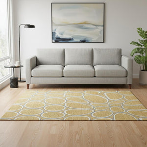 HomeRoots 5' X 8' Washable Geometric Area Rug in Gold, Ivory & Gray - Stain Resistant with UV Protection 681679