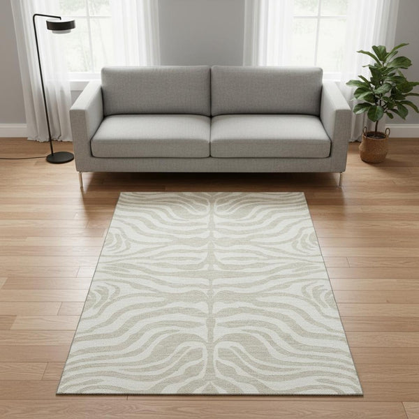 HomeRoots 5' X 8' Beige and Ivory Animal Print Area Rug - Washable, UV Protected, Perfect for Pets & Kids 681733