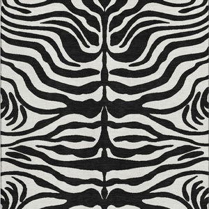HomeRoots 5' X 8' Black And Ivory Animal Print Rug - Washable, Stain Resistant, UV Protected for High Traffic Areas 681739