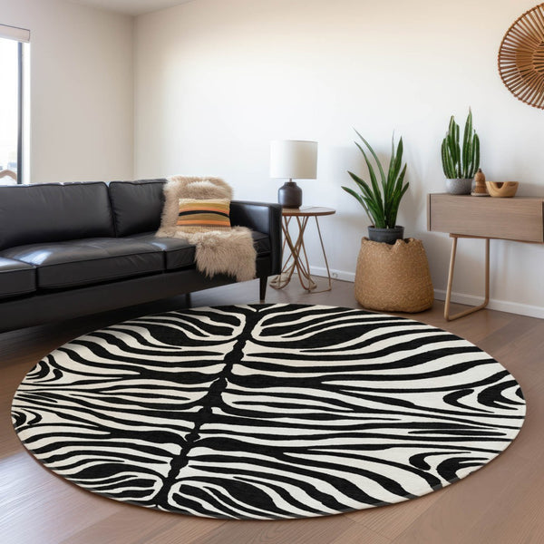 HomeRoots 8' Black And Ivory Animal Print Round Rug – Washable, UV-Protected, Stylish & Pet-Friendly Design! 681740