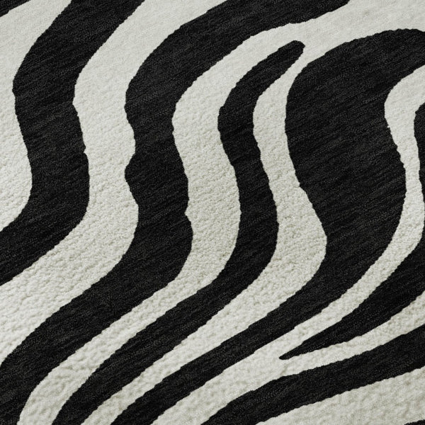 HomeRoots 8' Black And Ivory Animal Print Round Rug – Washable, UV-Protected, Stylish & Pet-Friendly Design! 681740