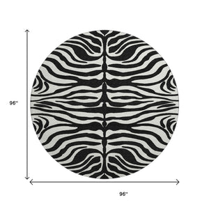 HomeRoots 8' Black And Ivory Animal Print Round Rug – Washable, UV-Protected, Stylish & Pet-Friendly Design! 681740