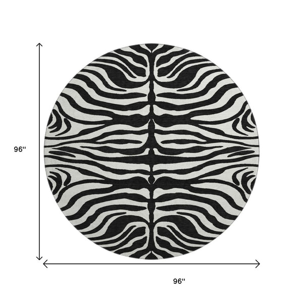 HomeRoots 8' Black And Ivory Animal Print Round Rug – Washable, UV-Protected, Stylish & Pet-Friendly Design! 681740