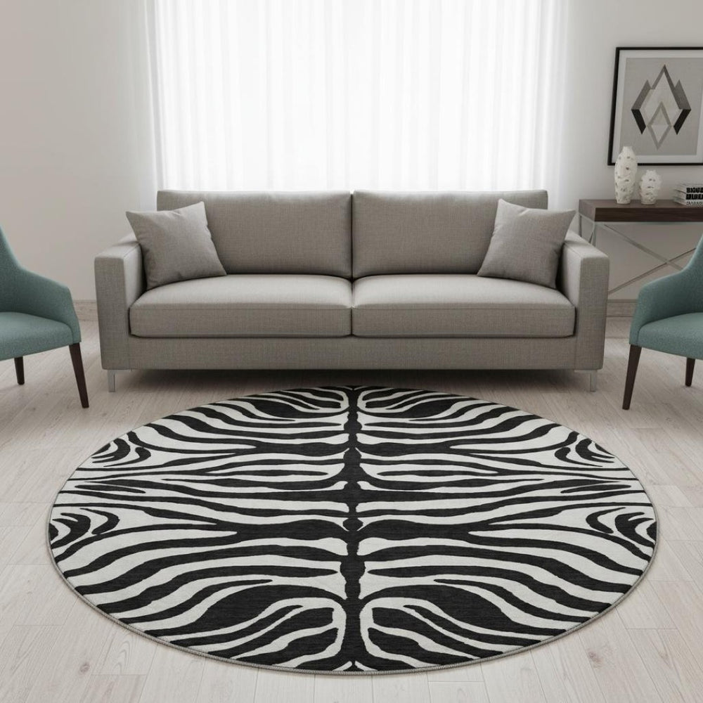 HomeRoots 8' Black And Ivory Animal Print Round Rug – Washable, UV-Protected, Stylish & Pet-Friendly Design! 681740