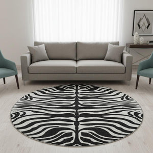 HomeRoots 8' Black And Ivory Animal Print Round Rug – Washable, UV-Protected, Stylish & Pet-Friendly Design! 681740