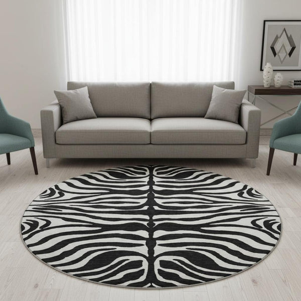 HomeRoots 8' Black And Ivory Animal Print Round Rug – Washable, UV-Protected, Stylish & Pet-Friendly Design! 681740