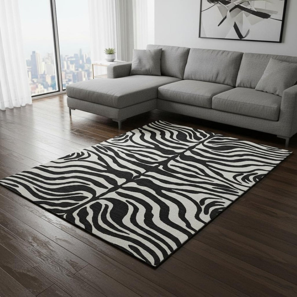 HomeRoots 9' X 12' Stylish Black and Ivory Animal Print Area Rug - Washable, UV Protected, Perfect for Homes! 681742
