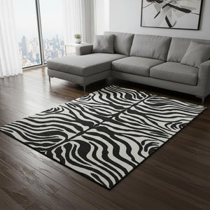 HomeRoots 9' X 12' Stylish Black and Ivory Animal Print Area Rug - Washable, UV Protected, Perfect for Homes! 681742
