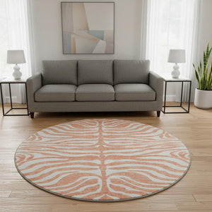 HomeRoots 8' Coral and Ivory Animal Print Round Rug - Washable, UV Protected, Durable Design for High Traffic Areas 681752
