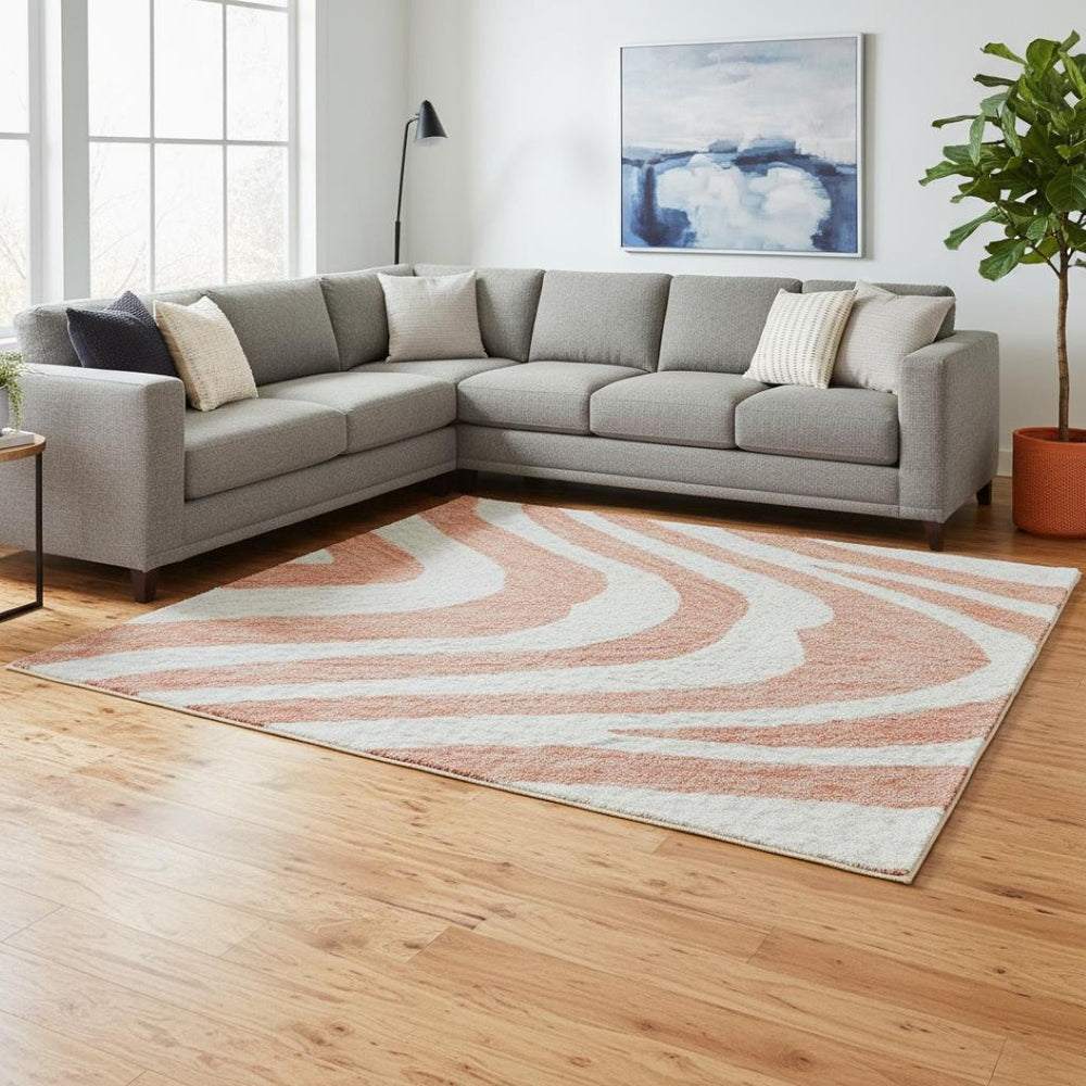 HomeRoots 10' X 14' Coral and Ivory Animal Print Washable Area Rug - Durable, Stain-Resistant, UV Protected Design 681755