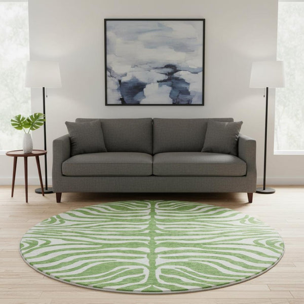 HomeRoots 8' Green And Ivory Animal Print Round Rug – Washable, UV Protected, Durable, Family-Friendly Design 681758