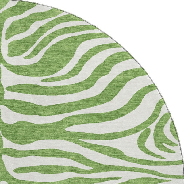 HomeRoots 8' Green And Ivory Animal Print Round Rug – Washable, UV Protected, Durable, Family-Friendly Design 681758