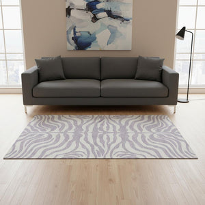 HomeRoots 5' X 8' Stylish Lavender & Ivory Animal Print Washable Area Rug with UV Protection & Easy Care 681775