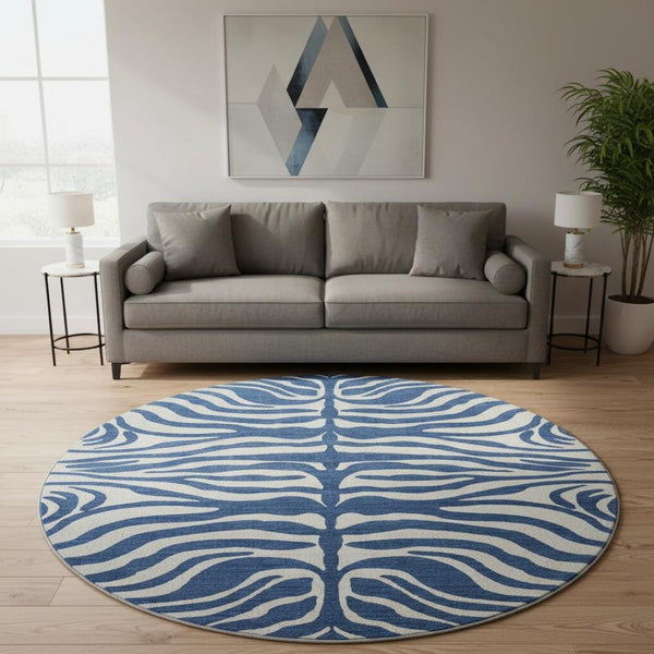 HomeRoots 8' Navy Blue and Ivory Animal Print Washable Round Rug with UV Protection for Stylish Spaces 681782