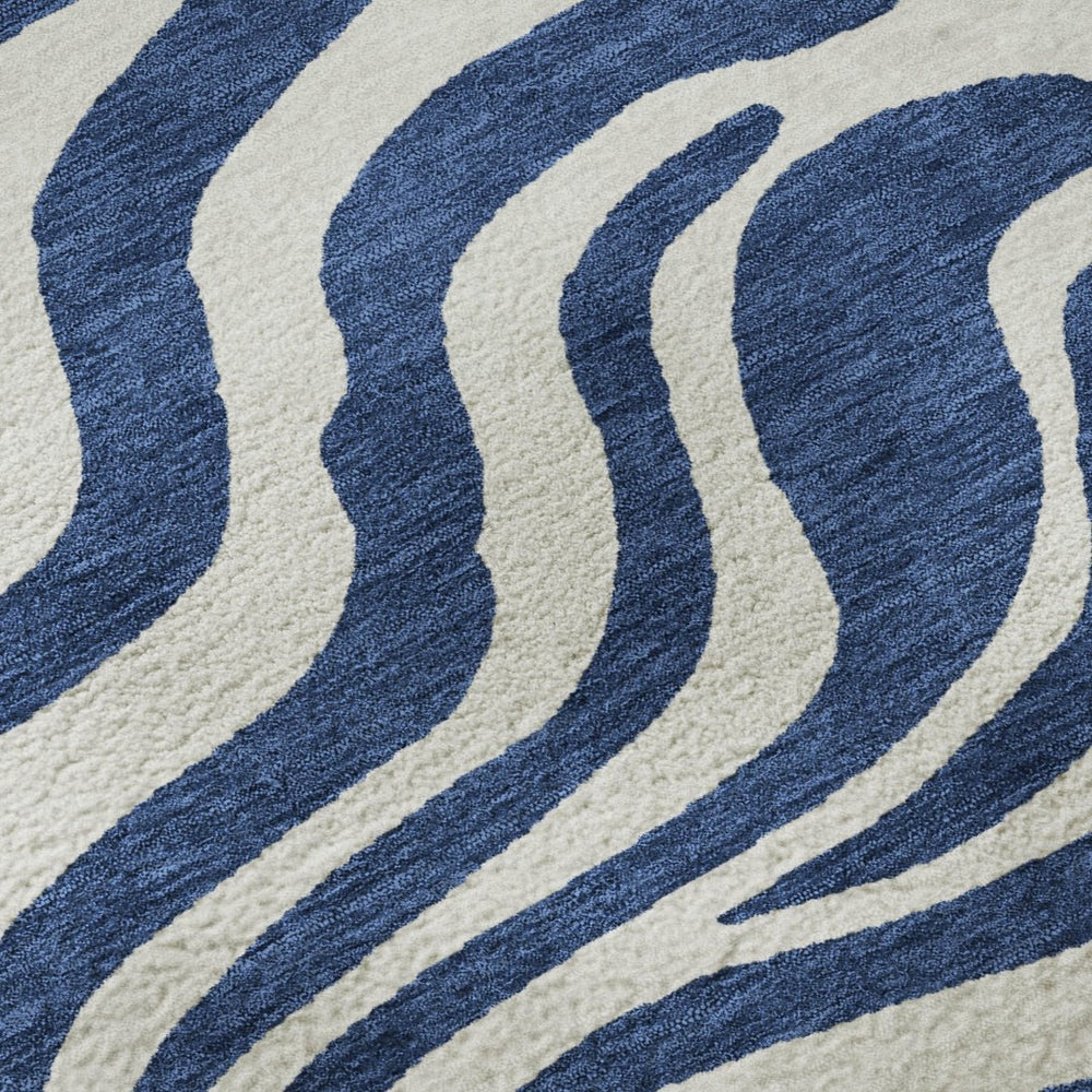 HomeRoots 9' X 12' Stylish Navy Blue & Ivory Animal Print Area Rug - Washable, UV Protected, Easy Care Design 681784