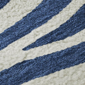 HomeRoots 9' X 12' Stylish Navy Blue & Ivory Animal Print Area Rug - Washable, UV Protected, Easy Care Design 681784