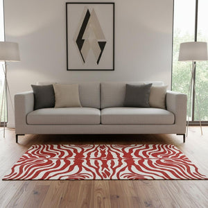HomeRoots 5' X 8' Red And Ivory Animal Print Area Rug - Stylish, Washable, UV-Protected for Everyday Use! 681799