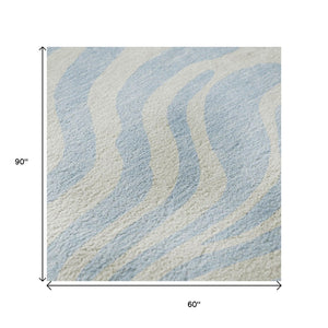 HomeRoots 5' X 8' Sky Blue & Ivory Animal Print Washable Area Rug - Durable, UV Protected & Easy Care Design 681805