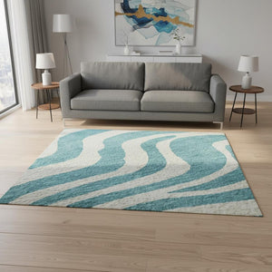 HomeRoots 5' X 8' Stylish Teal and Ivory Animal Print Area Rug – Washable, UV Protected, Kid & Pet Friendly! 681811