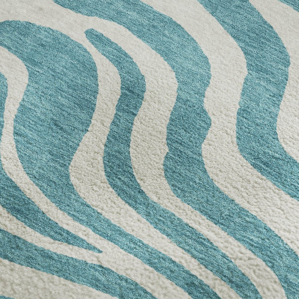 HomeRoots 5' X 8' Stylish Teal and Ivory Animal Print Area Rug – Washable, UV Protected, Kid & Pet Friendly! 681811