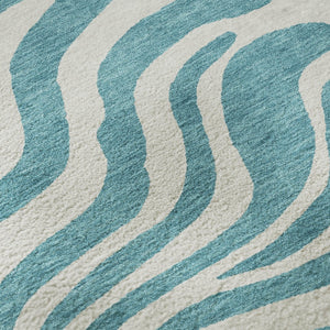 HomeRoots 9' X 12' Teal and Ivory Animal Print Area Rug - Washable, UV Protected, Perfect for Families! 681814