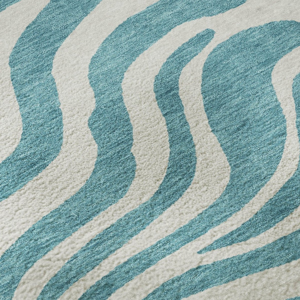 HomeRoots 9' X 12' Teal and Ivory Animal Print Area Rug - Washable, UV Protected, Perfect for Families! 681814