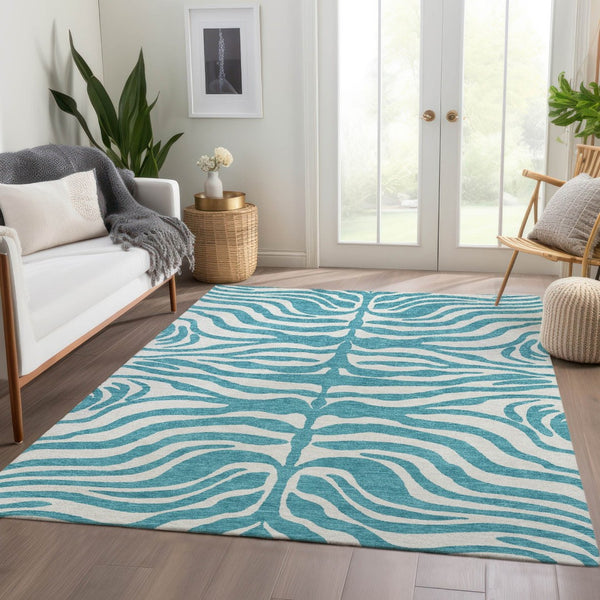 HomeRoots 9' X 12' Teal and Ivory Animal Print Area Rug - Washable, UV Protected, Perfect for Families! 681814