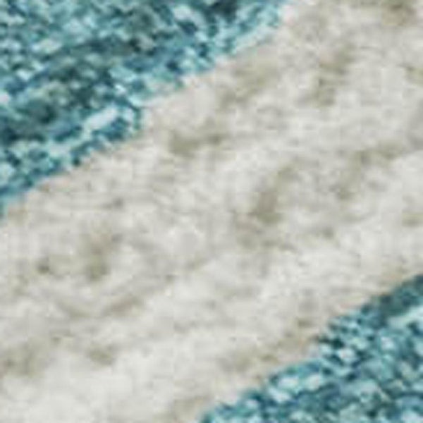 HomeRoots 10' X 14' Teal & Ivory Animal Print Area Rug - Washable, UV-Protected, Stylish for High-Traffic Homes 681815
