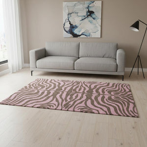 HomeRoots 5' X 8' Stylish Brown and Pink Animal Print Area Rug – Washable, UV Resistant, Perfect for Homes! 681817