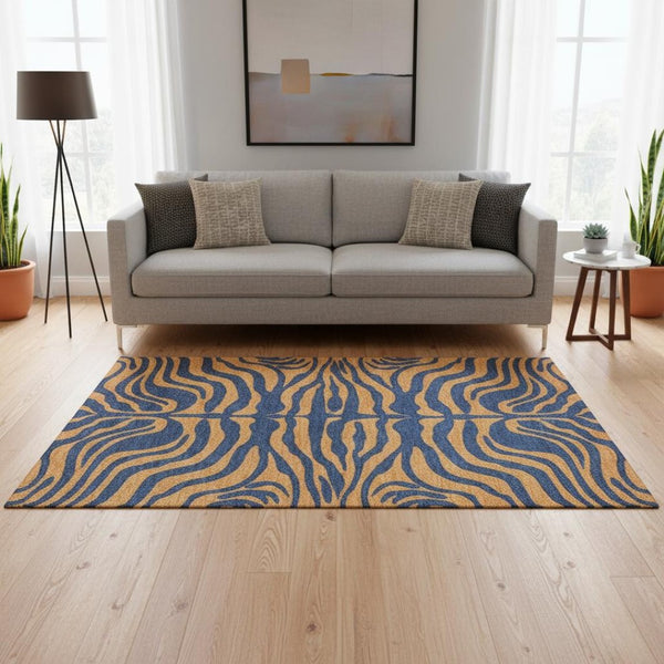 HomeRoots 5' X 8' Navy Blue & Orange Animal Print Rug - Washable, UV Protected & Soft for Pets & Kids! 681829