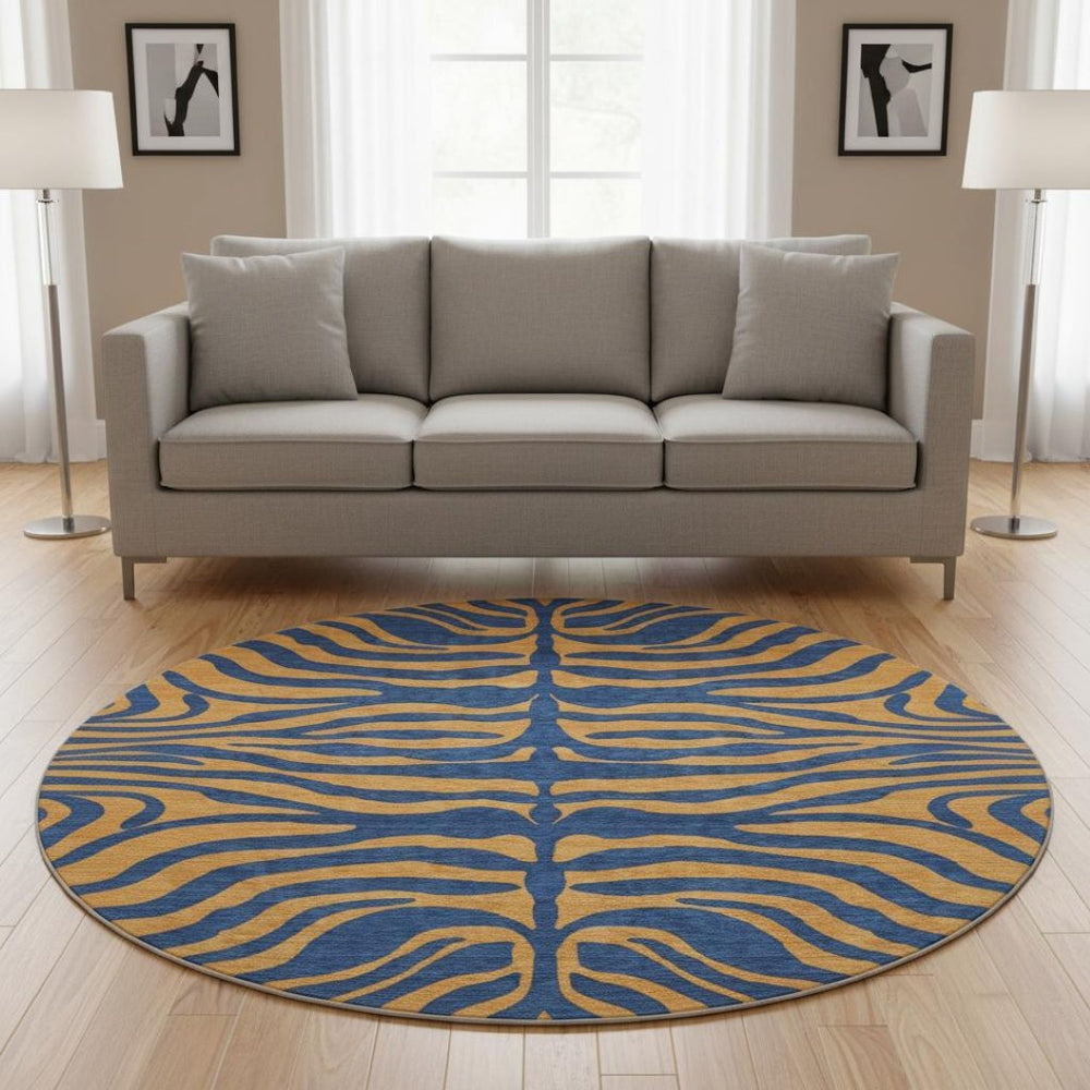 HomeRoots 8' Navy Blue and Orange Animal Print Round Rug - Washable, UV Protected, Durable for Homes & Patios 681830