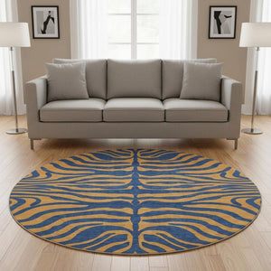 HomeRoots 8' Navy Blue and Orange Animal Print Round Rug - Washable, UV Protected, Durable for Homes & Patios 681830