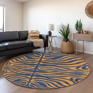 HomeRoots 8' Navy Blue and Orange Animal Print Round Rug - Washable, UV Protected, Durable for Homes & Patios 681830