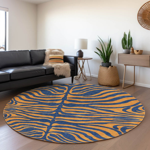 HomeRoots 8' Navy Blue and Orange Animal Print Round Rug - Washable, UV Protected, Durable for Homes & Patios 681830